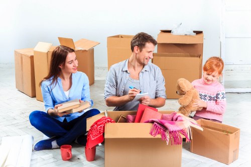 Local commercial movers handling office items in Merton