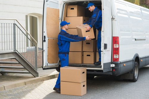 Careful loading of household furniture during a Merton move
