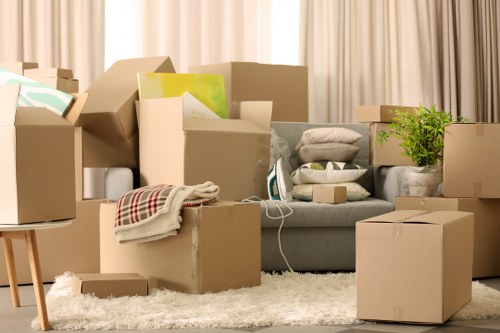 Packed office equipment and furniture ready for relocation
