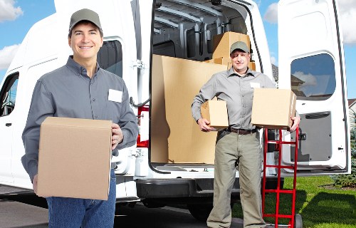 Business relocation transport and office furniture setup for a Merton office move