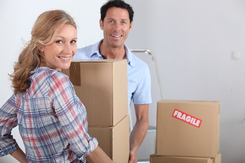 Unpacking boxes into a new home in Merton after relocation
